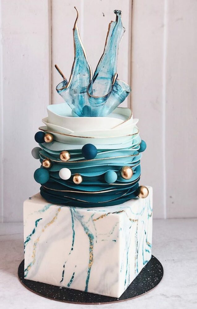 Modern teal, white and gold wedding cake