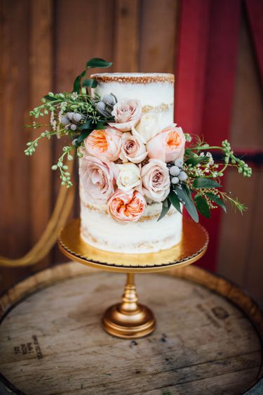 Naked wedding cake with florals