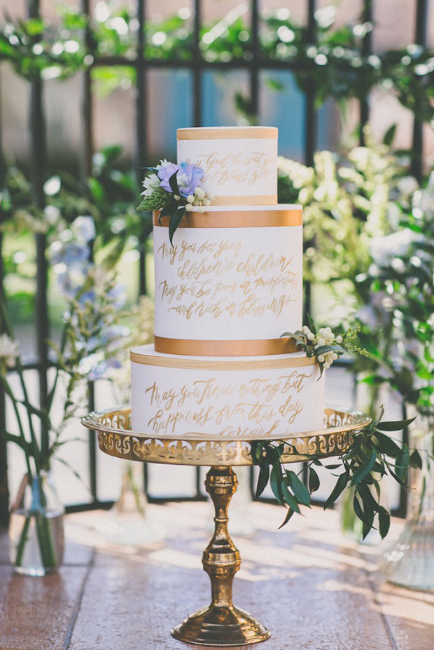 Gold calligraphy wedding cake