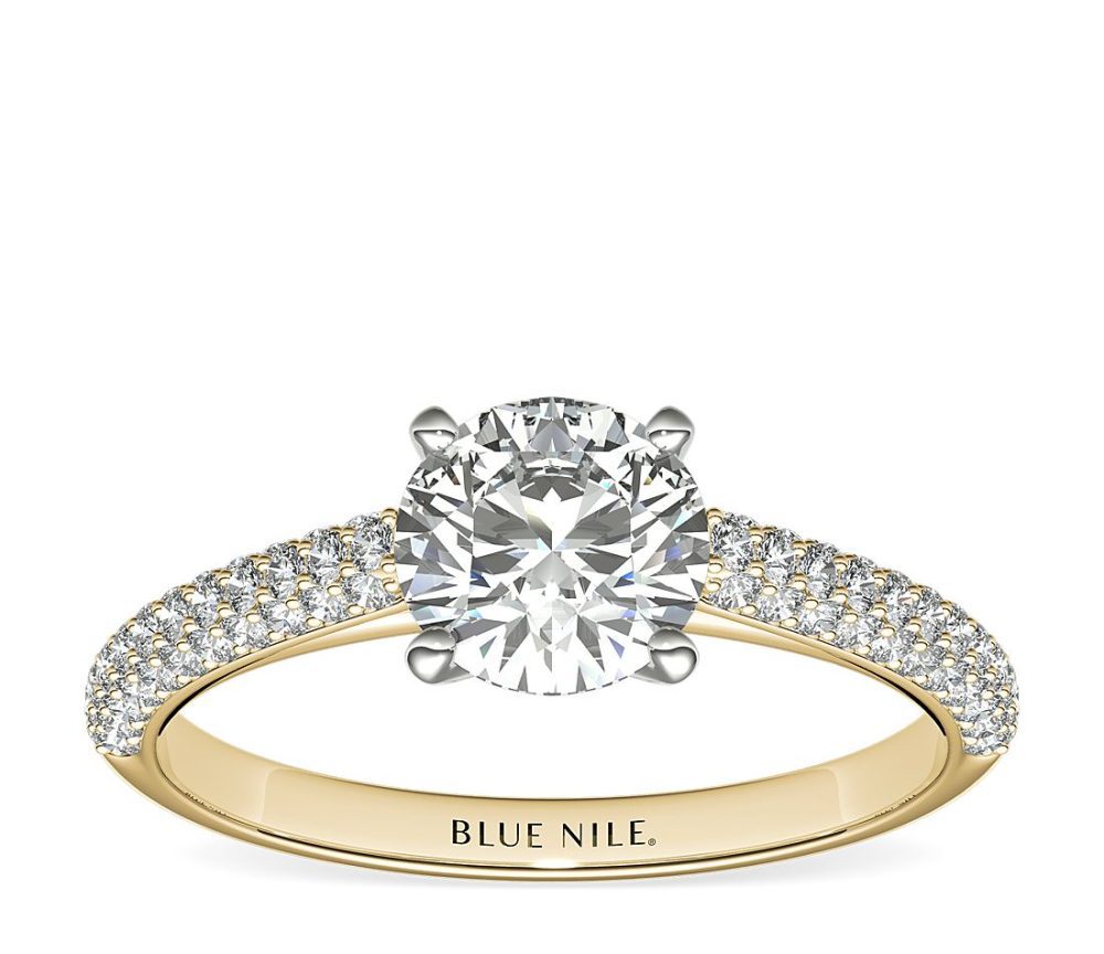 Petite solitaire engagement ring