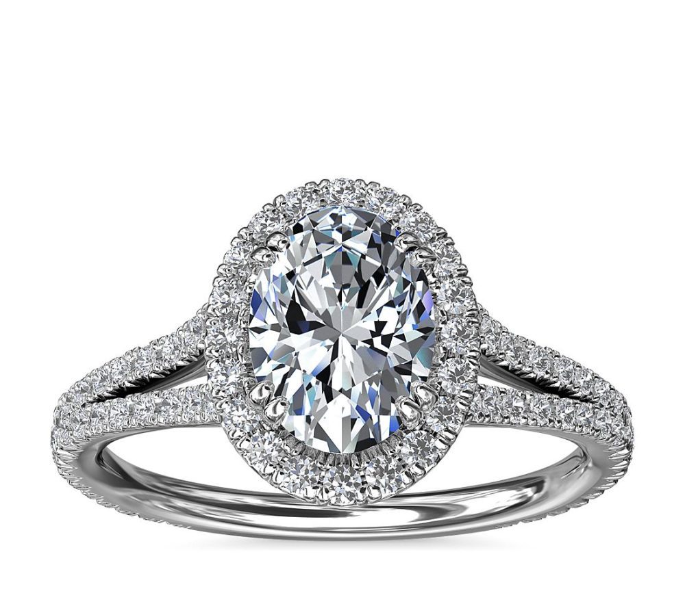 Oval split-shank diamond halo engagement ring
