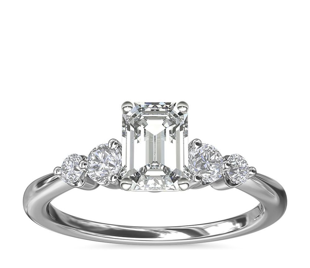 Petite double sidestone diamond engagement ring