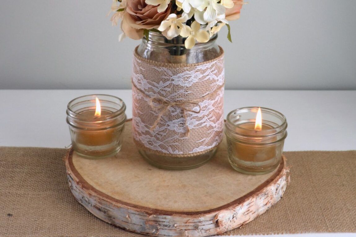 Burlap and lace wrapped mason jar with flowers