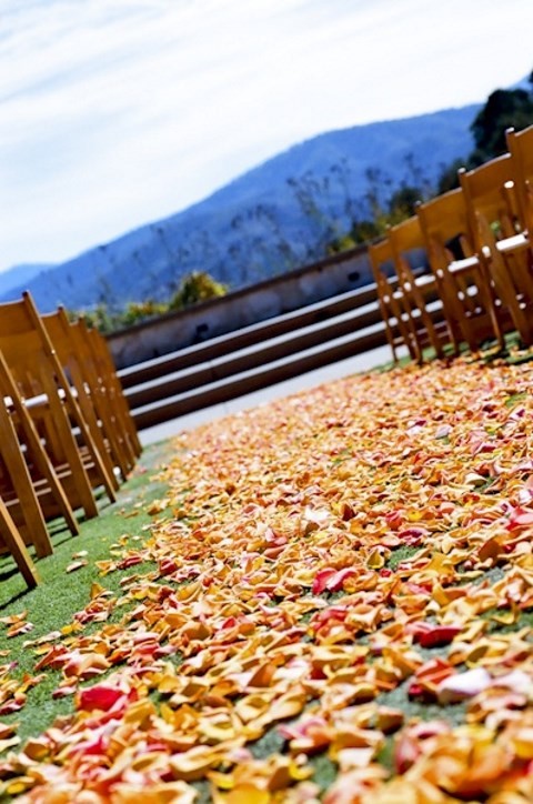 fall wedding leafs on the aisle
