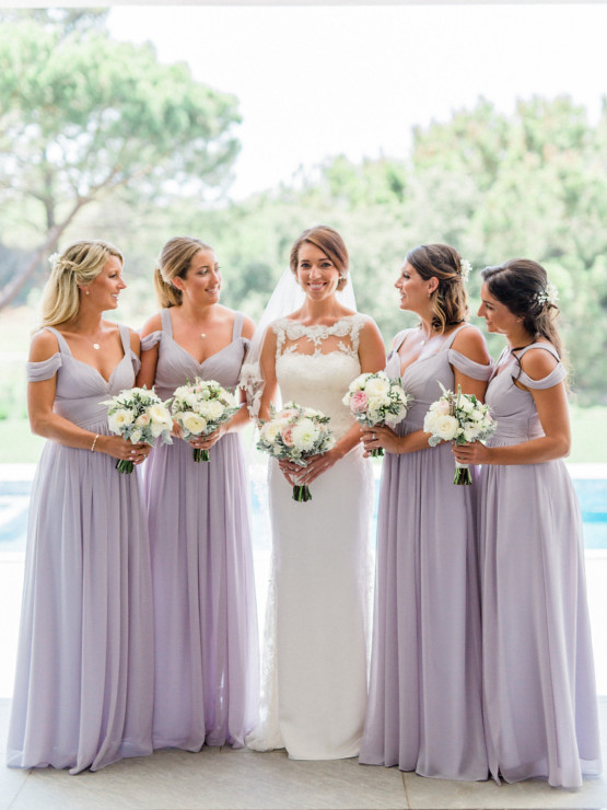 Bride with bridesmaids in lavender dresses