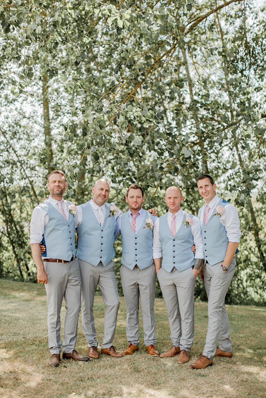 Pastel blue groomsmen vests