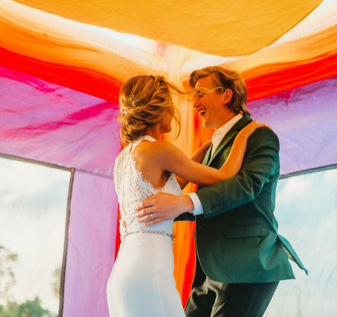 solve your wedding planning dilemmas by doing what makes you happy, like getting a wedding bounce house!