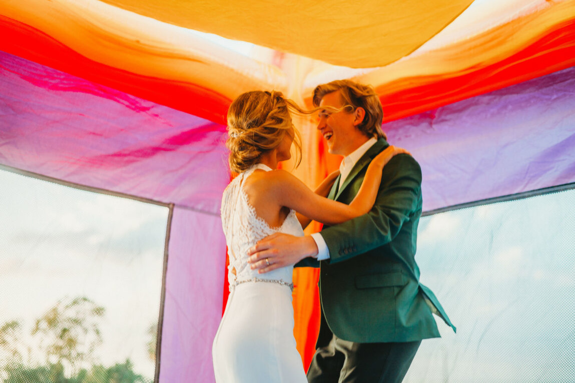 solve your wedding planning dilemmas by doing what makes you happy, like getting a wedding bounce house!