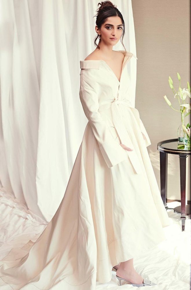Sonam Kapoor wearing an off-shoulder Danielle Frankel wedding dress
