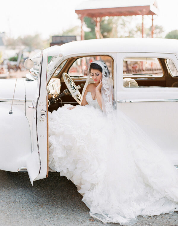 Pose With Your Dress Flowing Out Of A Classic Car