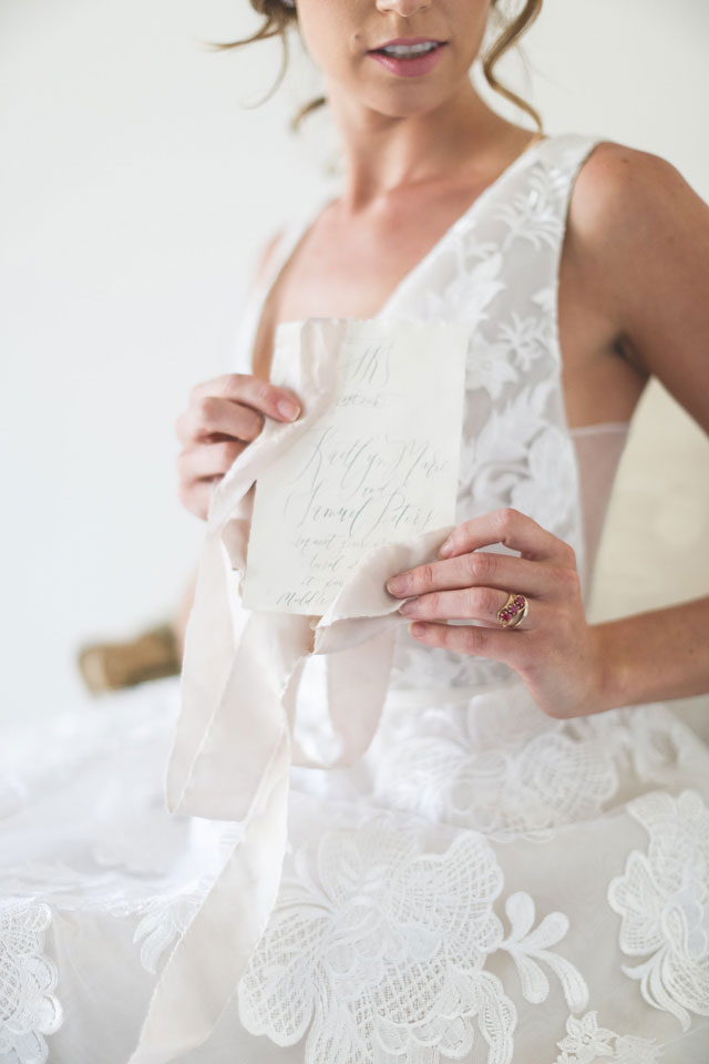 A stunning sunset bridal inspiration shoot with a welcome basket, ethereal calligraphy and exquisite florals by Anny. Photography