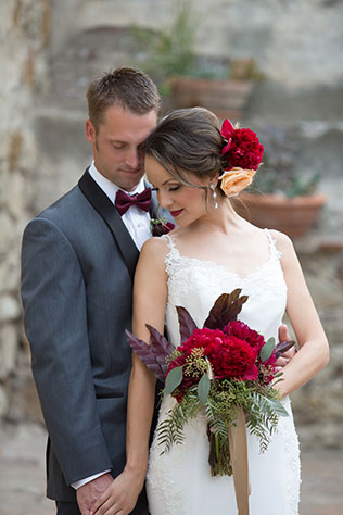 A classic red Spanish-inspired look for the bride and groom by Chloe Atnip Photography