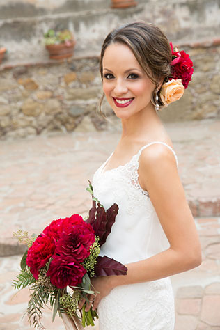 A classic red Spanish-inspired look for the bride and groom by Chloe Atnip Photography