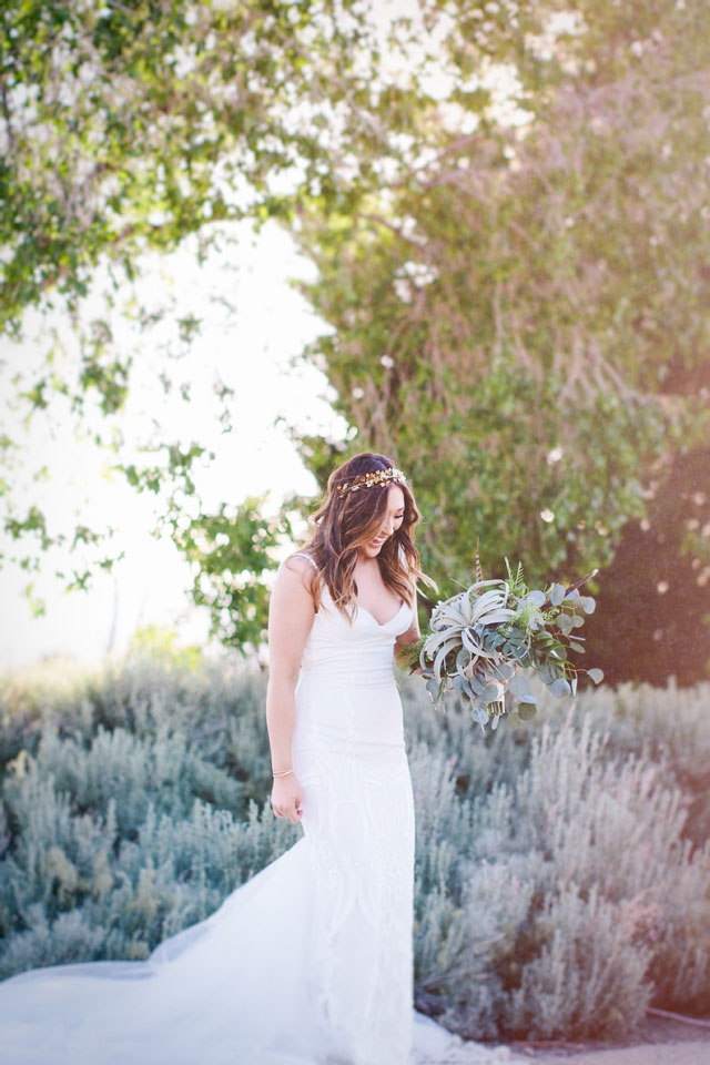 A creative styled shoot featuring bohemian desert whites, air plants and mixed metals by Gagewood Photo and Audere Events