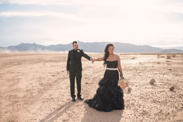 Stunning bride and groom portraits taken at the Dry Lake Bed in the Mohave Desert | Katie Brsan Photography