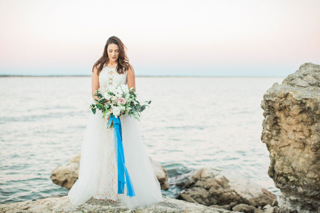 A quietly romantic beach bridal session with muted and deep blues by Kortney Boyett Photography