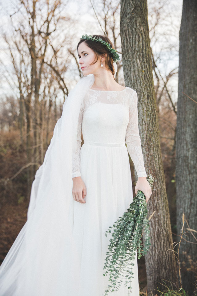 Elegant winter eucalyptus bridal portraits in Chicago by Megs Colleen with a handmade wedding gown from Cambodia
