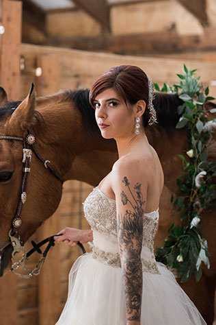 Gorgeous snowy white bridal portraits with a horse by Stella Blue Photography