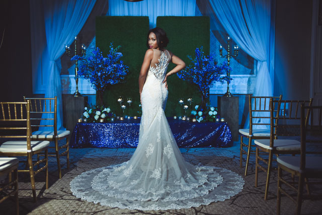 A stunning blue and green wedding inspiration shoot with dramatic lighting by 5 Rivers Studio and Sage Designs