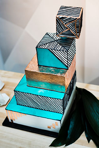 A modern wedding styled shoot at a contemporary art museum with geometric details, greenery and a gravity defying cake by Abigail Volkmann Photography