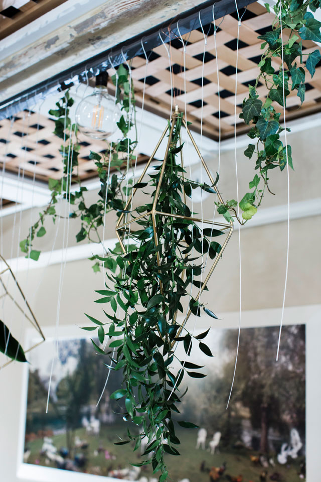 A modern wedding styled shoot at a contemporary art museum with geometric details, greenery and a gravity defying cake by Abigail Volkmann Photography