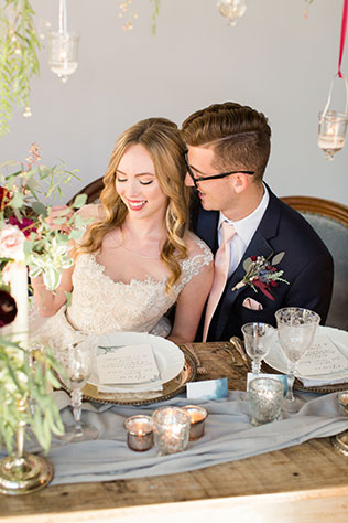 An exquisite dusty blue, burgundy and blush winter wedding styled shoot with lush florals and a romantic sweetheart table by Alexandra Lee Photography