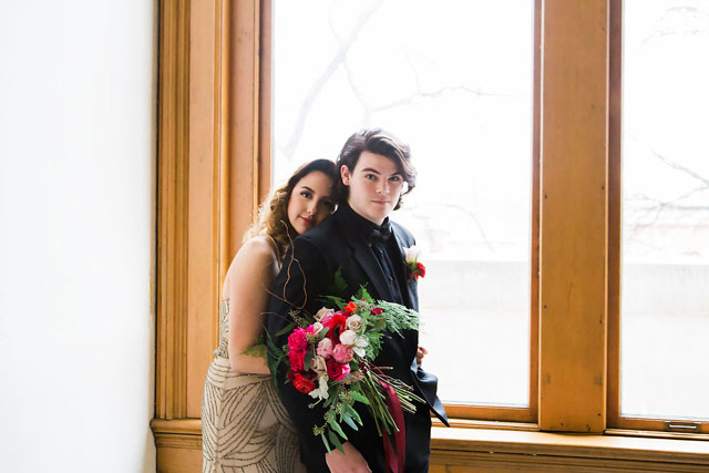 An urban watercolor elopement styled shoot with a palette of gold, pink, red and black, and a beautiful beaded gown by Allie & John Photography