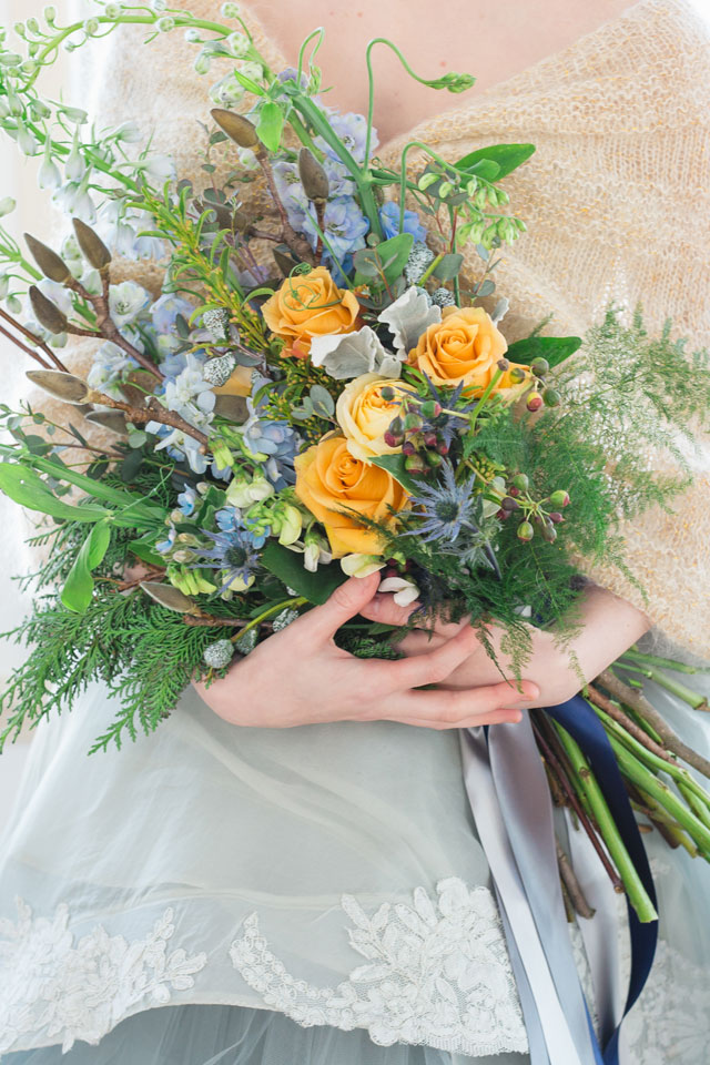 A refined and sophisticated blue and gray winter wedding inspiration shoot in Vermont with gorgeous gold accents by Amy Donohue Photography