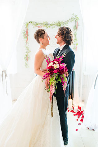A bold and beautiful Charm in the City wedding inspiration shoot with a vibrant palette of red, gold and black with pops of pink by Ashton Kelley Photography
