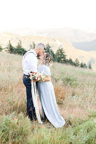 A simple yet stunning mountaintop styled elopement with lush floral designs and fresh fruit by When She Knew Photography
