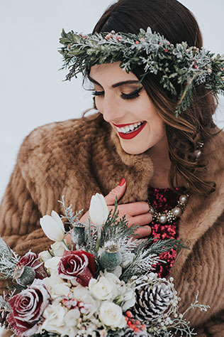 A snowy and moody winter woods styled shoot with a stunning red sequined dress by Britani Edwards Photography