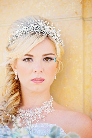 A Frozen-inspired wedding styled shoot featuring the Elsa Wedding Dress from Alfred Angelo's Disney Fairy Tale Bridal collection // photo by Contemporary Captures Photography: http://www.contemporarycaptures.com || see more on https://blog.nearlynewlywed.com