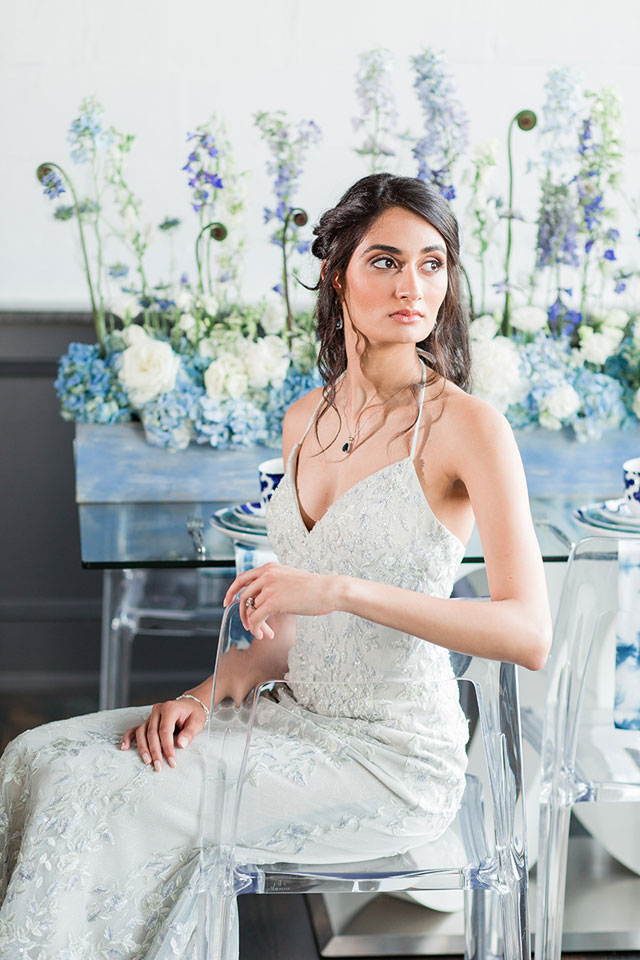A stunning, monochromatic dreamy ice blue wedding inspiration shoot inspired by David Bridal's Fall 2017 collection, designed by Aisle Society and photographed by Cassi Claire