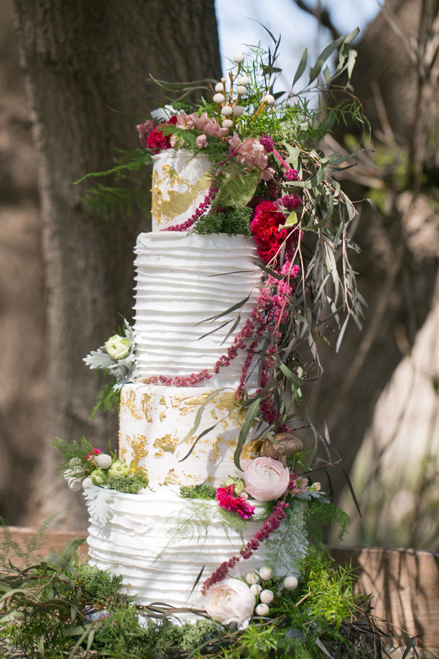 An enchanting lost in the woods styled shoot at Bloom Lake Barn with gorgeous floral designs and a rich red palette by Erin Johnson Photography
