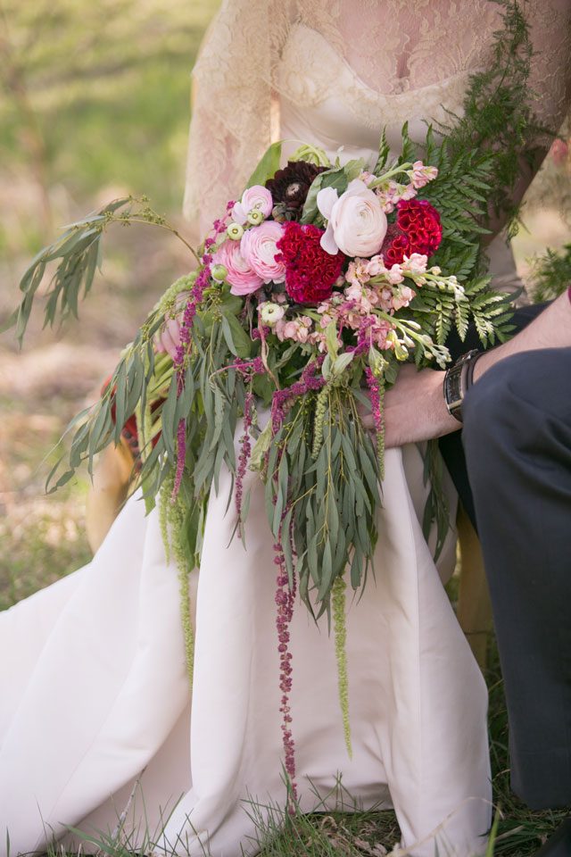 An enchanting lost in the woods styled shoot at Bloom Lake Barn with gorgeous floral designs and a rich red palette by Erin Johnson Photography