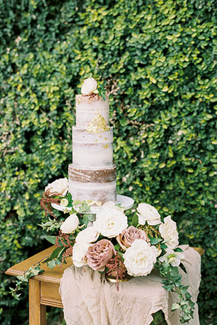 A California Spanish mission wedding styled shoot with terra cotta details, greenery, rich florals and traditional Spanish cultural elements by Grace Aston Photography