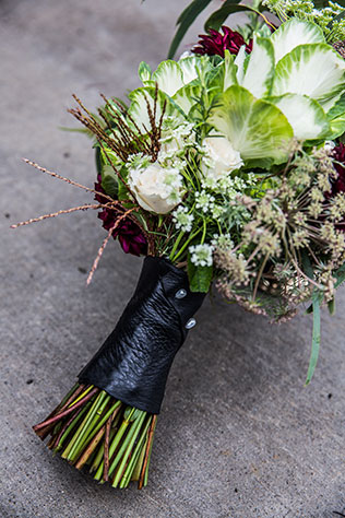 A moody yet elegant rebel wedding inspiration shoot in Portland with leather and a motorcycle by Jenna Saint Martin Photo and Bramble Floral Design