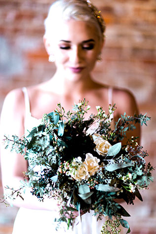 An industrial wedding inspiration shoot with copper and organic wood and floral details by Jessica Bradford Photography