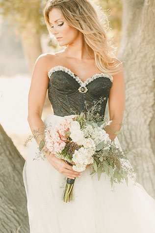 A dreamy wedding styled shoot featuring a tulle skirt paired with a black lace bustier | Kristen Booth: http://www.kristenbooth.net