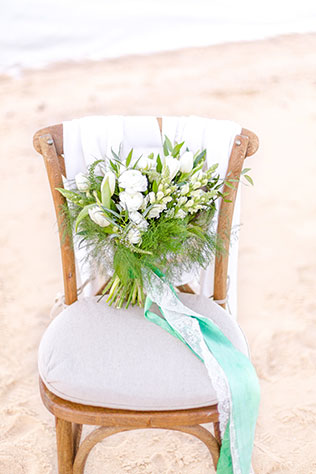 An airy and light seaside winter wedding inspiration shoot with a beachy green palette by Lauren Werkheiser Photography