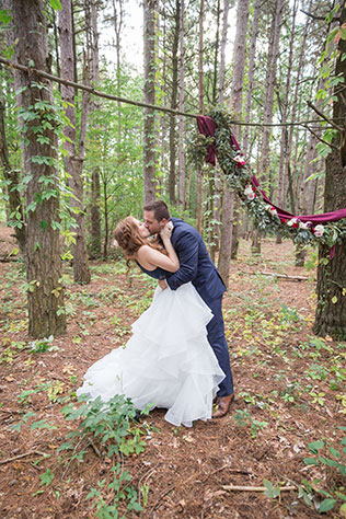 A wooded wedding inspiration shoot in Michigan with a bold yet classic palette of navy blue and rich merlot by Lisa Hammond Photography