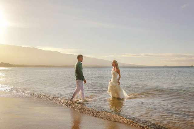 A couple celebrates their seventh wedding anniversary with a trash the dress shoot in Maui | Love and Water Photography: lovewaterphoto.com