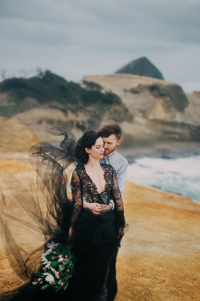 A moody coastal elopement on Cape Kiwanda with a black lace dress and waves crashing in the background by Mari Sabra Photography and Rose & Stone