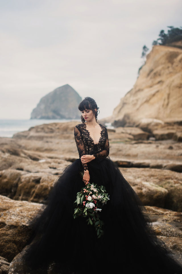 A moody coastal elopement on Cape Kiwanda with a black lace dress and waves crashing in the background by Mari Sabra Photography and Rose & Stone