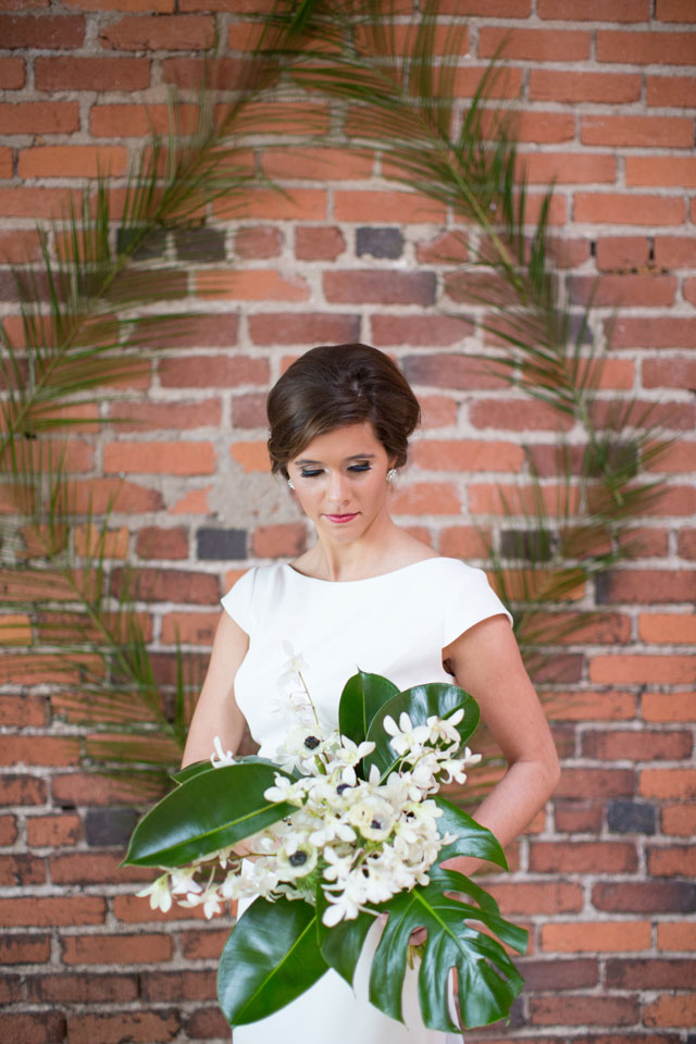 A vibrant and glam mid-century modern wedding inspiration shoot with sparkle by Marissa Cribbs Photography