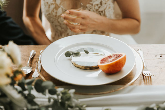 Lush and wild greenery abounds in this modern bridal inspiration shoot with organic details and blood orange by Oh So Lovely Photography and Jayne Weddings & Events