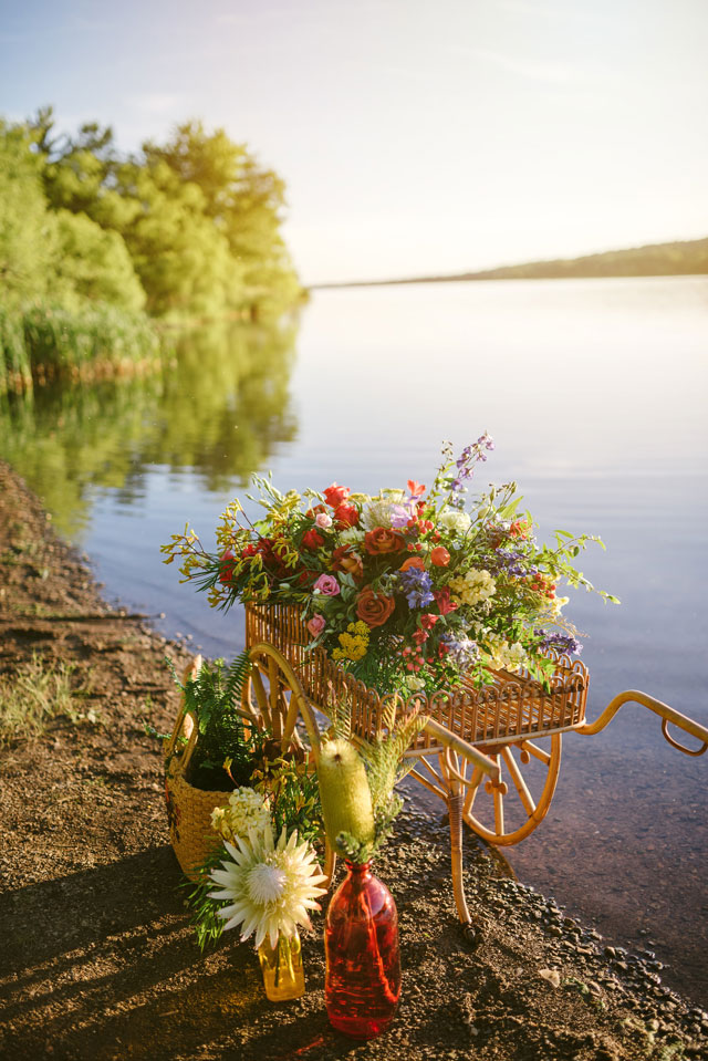 A 1960s picnic elopement styled shoot on Lake Galena inspired by the Point of Tranquility by Shunkwiler Photo and Julie D'Agostino Designs