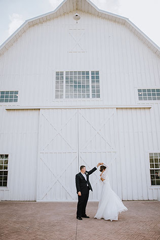 A dreamy white lace and roses wedding inspiration shoot at The White Sparrow Barn by Silver Bear Creative