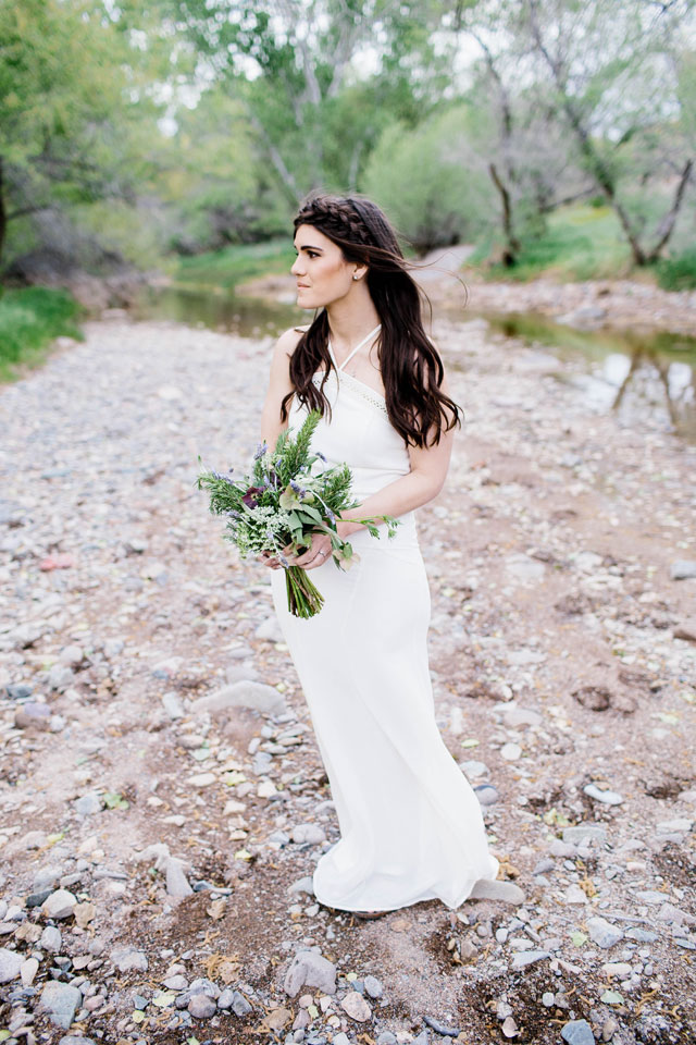 A desert elopement styled shoot in Arizona's Cave Creek including a horse and a natural palette of cream, green and lavender by Taylor Bellais Photography and Desert Whim