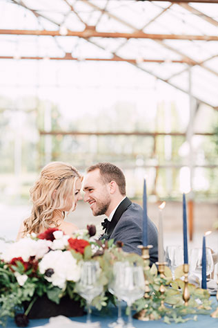 An ethereal greenhouse wedding inspiration shoot featuring rich colors and golden details by Victoria Isabel Photography